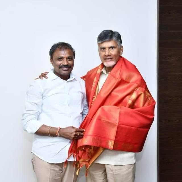 Nukavarapu Balaji in a photograph with a Telugu Desam Party leader